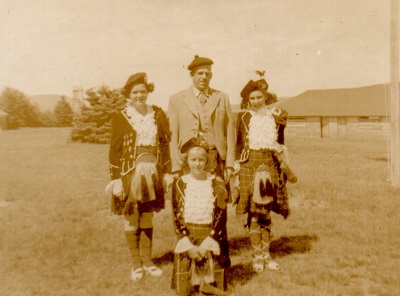 Major Calum Iain Nicolson MacLeod with the young attendees of a summer camp, 1949